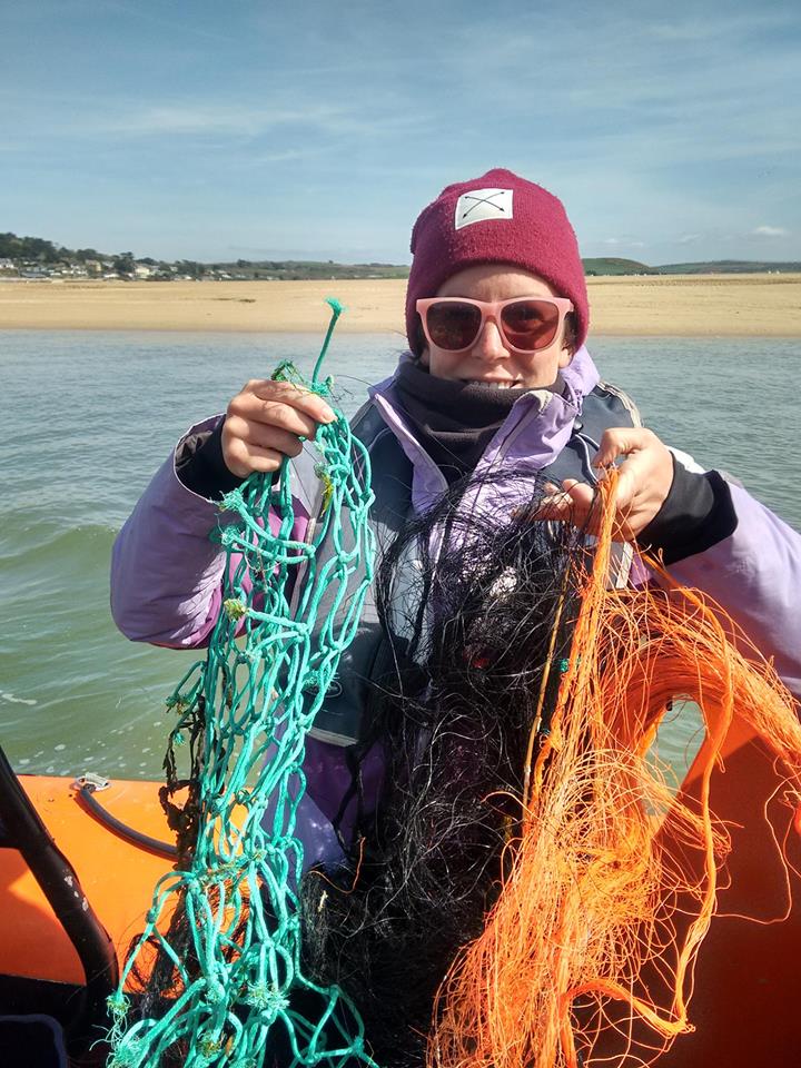 Jenny picking up 'ghost gear'. Old fishing nets that are drifting needlessly in our oceans.