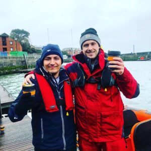 Calum and Tom using re usable eco cups